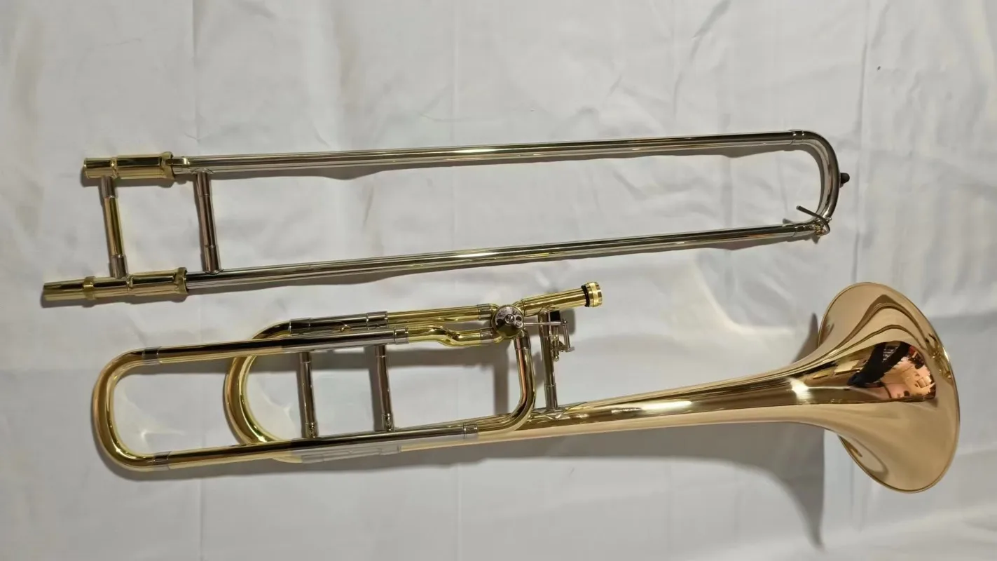 Горячая распродажа: Тромбон, р – обзор и цена Musical Instrument Logo